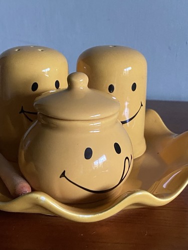 Yellow smiley faced - faced, condiment
