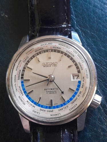 Seiko world time - world,
