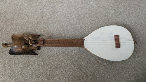 Antique hand carved folk lute - hand,