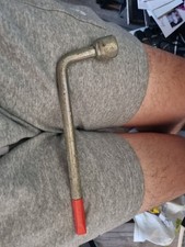 VINTAGE FORD WHEEL BRACE