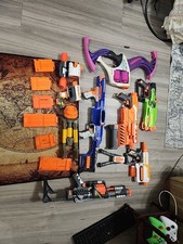 Lot Of Nerf Guns And Accessories,  6 Guns,  5 Magazines And Various Attachments