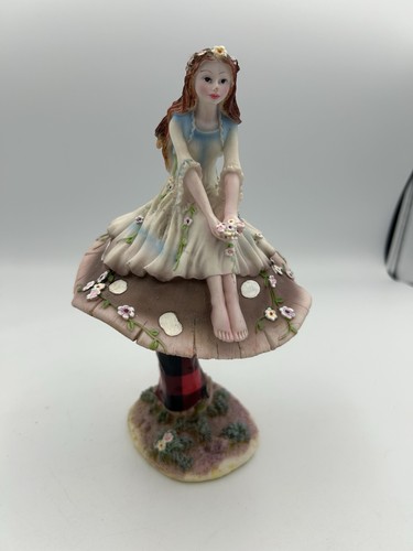 Fairy sitting toadstool - toadstool,