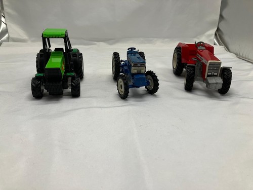 Set three toy tractors - set, of