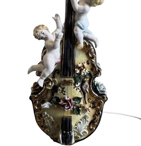 Capodimonte cherub table - cherub,