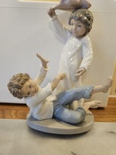 Lladro/Nao Figurines 2 Boys Having Pillow Fight  H24cm X W17cm Vgc