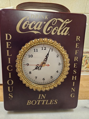 Coca cola clock and - and, holder