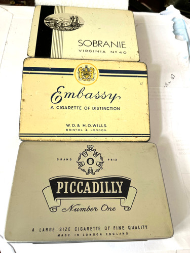 Cigarette tobacco tins - /,