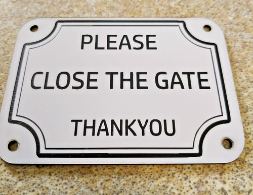 Please close the gate sign - the,