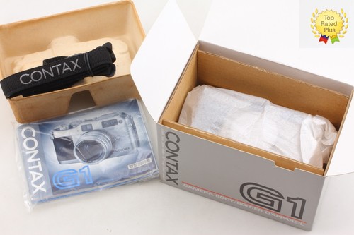 Mint box contax - ],