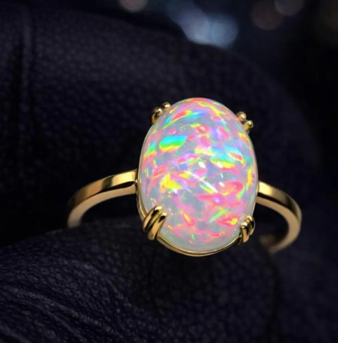 Genuine oval cut fire - cut, opal