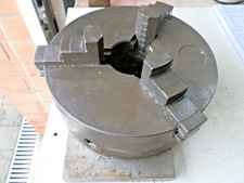 7.5" diameter 3 jaw chuck mounted in steel plate