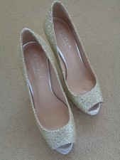 CARVELA BRAND NEW GOLD AND