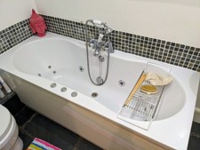 Corner Jacuzzi bathtub, white