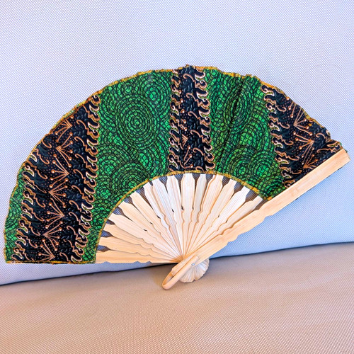 Vintage folding hand fan - hand, green