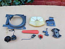 Genuine used Husqvarna 254 chainsaw small parts, air filter, clutch, caps etc.