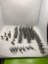 random collection of miniature toy soldiers vintage around 1970s