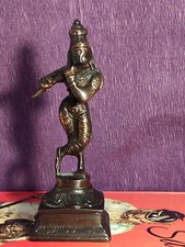 INDIAN BRONZE FIGURINE OF THE HINDU ''LORD KRISHNA'' PLAYING A FLUTE.