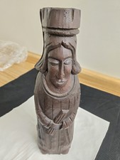 Vtg mcm plastic faux wood carved conquistidor hidden wine bottle holder.