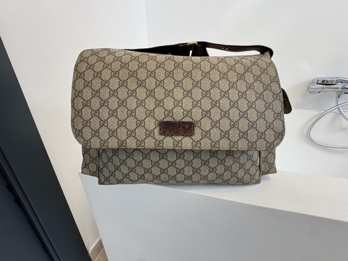 Gucci baby diaper changing - diaper,
