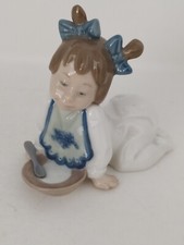 Nao by Lladro Baby Girl In Babygrow With Plate Of Porridge And Spoon -