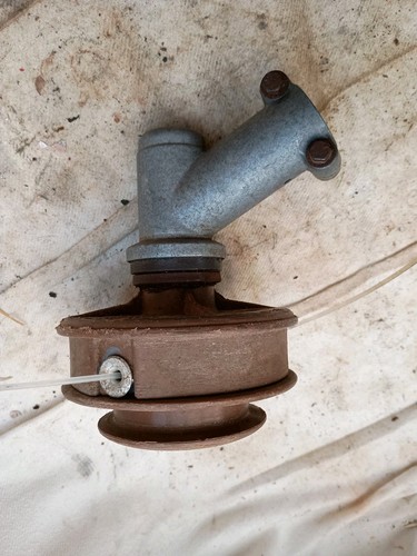 Petrol strimmer gear - head, and
