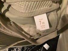 Tilley hat for woman or man, used once so small mark which could be removed.