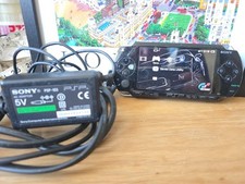 PSP 1003 Console W/ Original Charger and a memory card & Screen Protector
