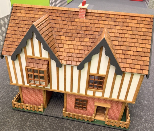 Wooden tudor cottage doll - wooden,