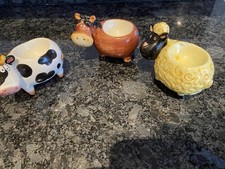 Three Ceramic egg Cups, Cow