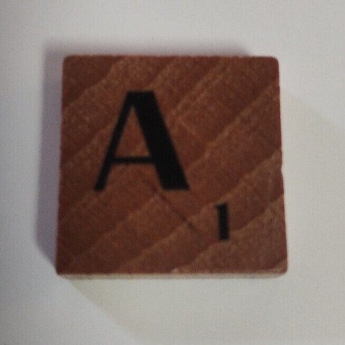 Dark wooden scrabble tiles - dark,