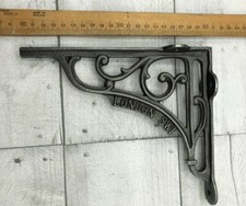 PAIR OF CAST IRON "LONDON