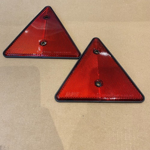 Reflective triangles for - x,