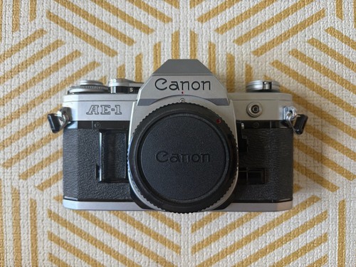 Canon silver 35mm camera - ae-1,