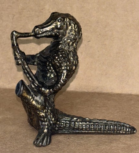 Alligator playing saxophone - alligator,