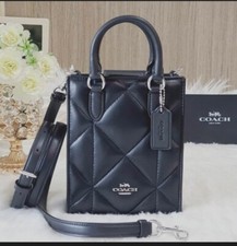 NWT COACH CJ580 North South