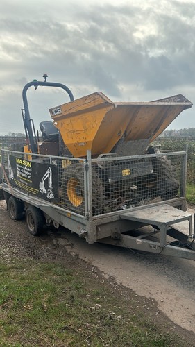 Man and digger - and,