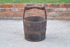 old vintage wooden rice bucket