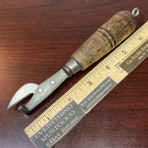 Antique tin can opener - opener, punch