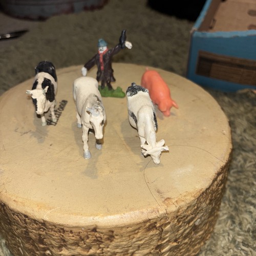 Toy farm animals and - animals, scarecrow
