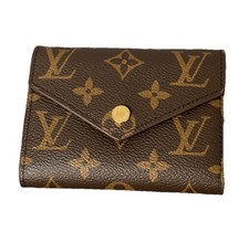 Louis Vuitton Women's Brown Monogram Leather Trifold Wallet