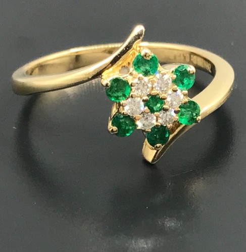 Emerald diamond cluster ring