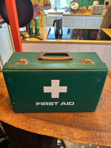 Vintage retro green first - first, aid