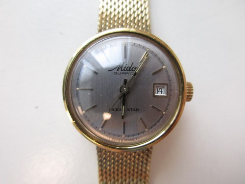 Mido ocean star quartz swiss - star,