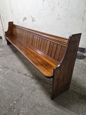 Antique solid church pew monks