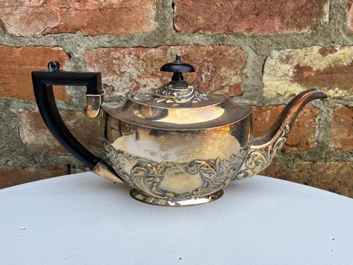 Antique silver plated teapot.