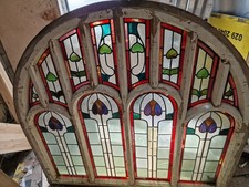 Arched timber window with