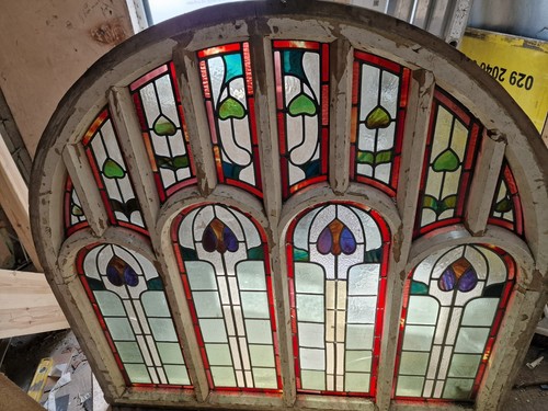 Arched timber window with