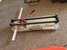 Rubi TX-700 N Tile Cutter. Barely Used. Spares Heads Included