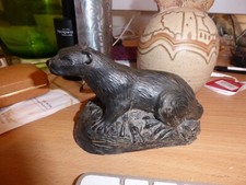 Bronze effect resin otter figure