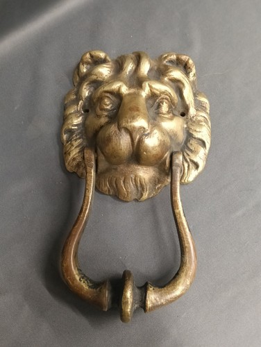 Lions head brass door knocker - door,